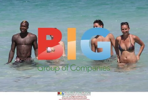 Jibril Cisse and wife Jude Littler on holiday with Samir Nasri