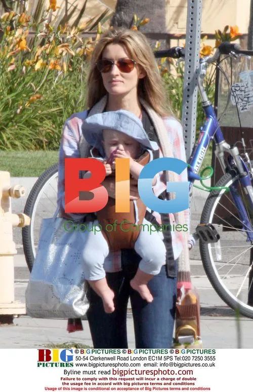 Natasha Mcelhone out with newborn son
