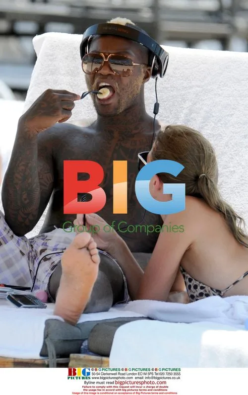 Djibril Cisse and wife Jude Littler on Miami beach