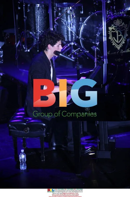 Nick Jonas performing at concert in NYC