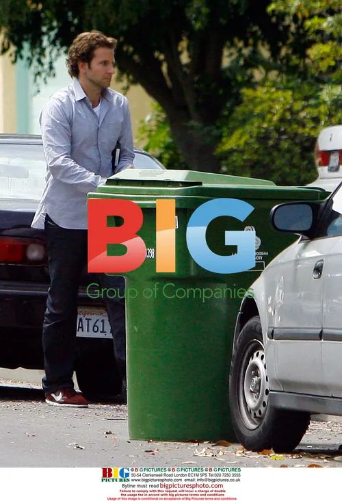 Bradley Cooper Takes Out Trash at LAX