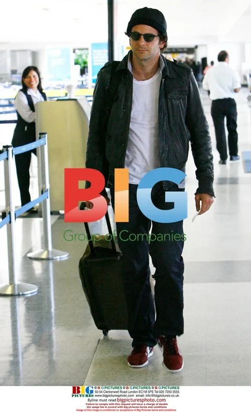 Bradley Cooper takes out trash at LAX