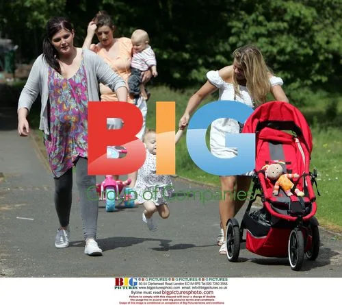 Kerry Katona with children in park