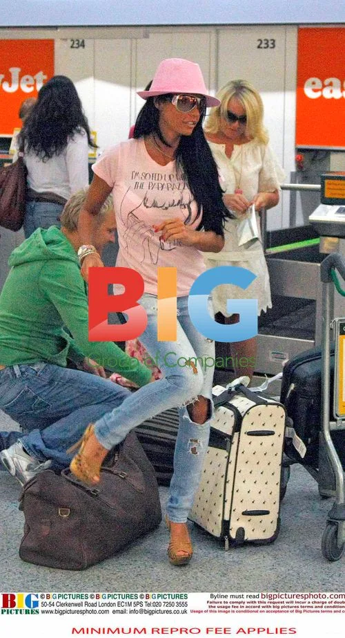 Katie Price Arrives at Airport
