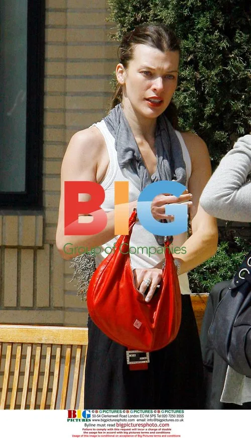 Mila Jovovich shops in Beverly Hills