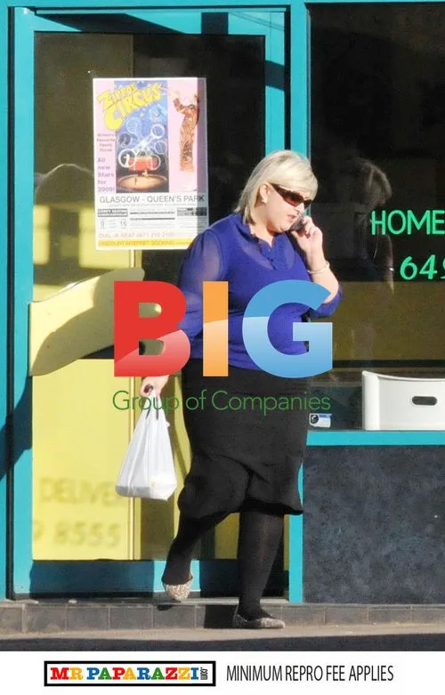 Michelle McManus loading Tesco bags