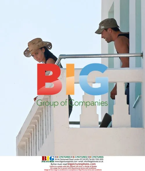 Katie Price and friend on balcony in Spain