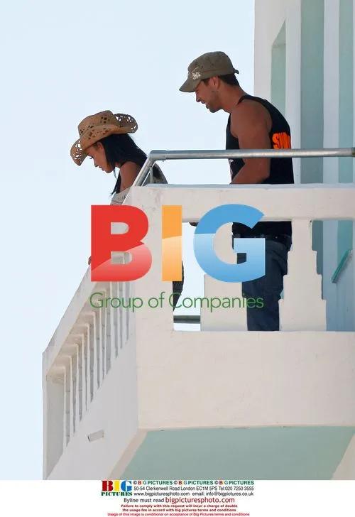 Katie Price and friend Anthony on Spain balcony