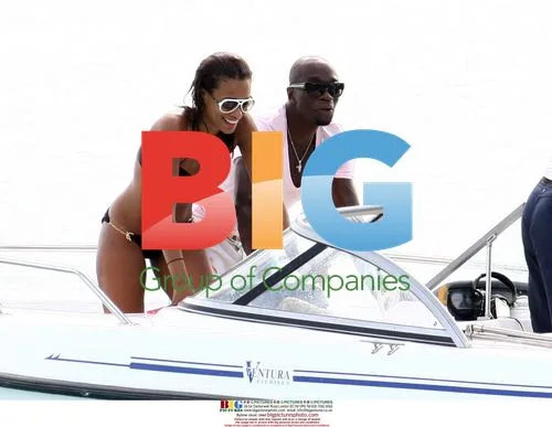 Claude Makelele and mystery woman water skiing