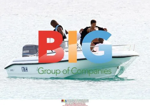 Makelele and mystery woman water skiing in Caribbean