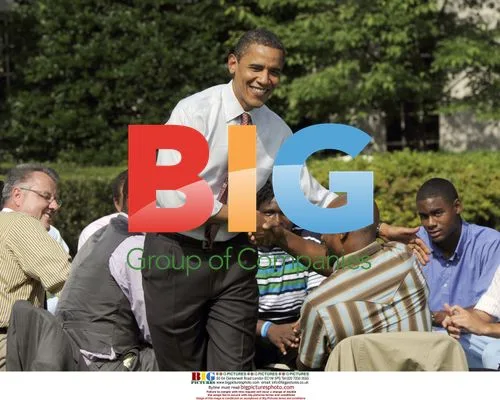 Obama shakes hands with NFL player