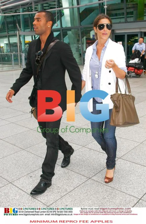 Ashley and Cheryl Cole Arrive in UK