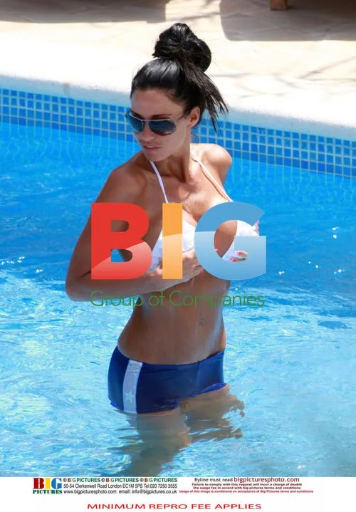 Katie Price Sunbathes in Ibiza
