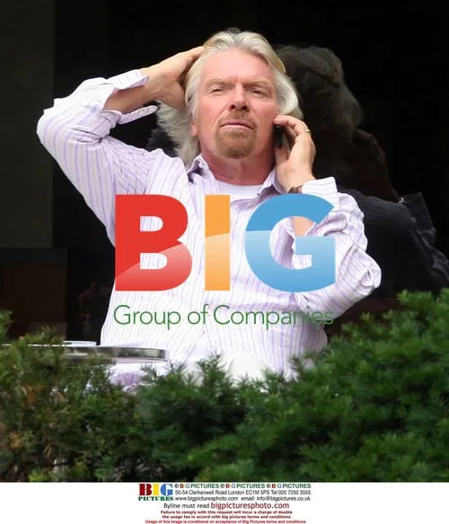Richard Branson and son talk at Trump Hotel