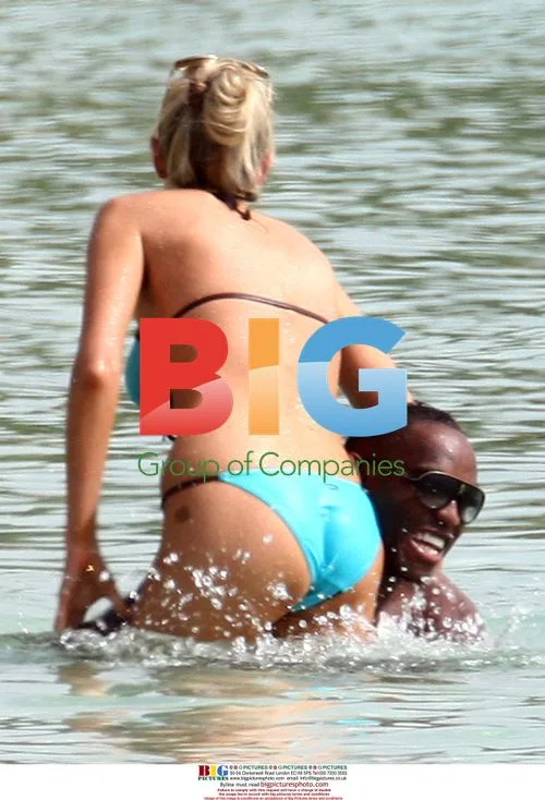 Blackburn Rovers Player Relaxes on Caribbean Beach