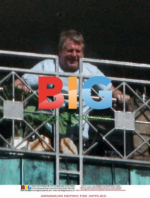 Ryan O'Neal on Farrah Fawcett's balcony