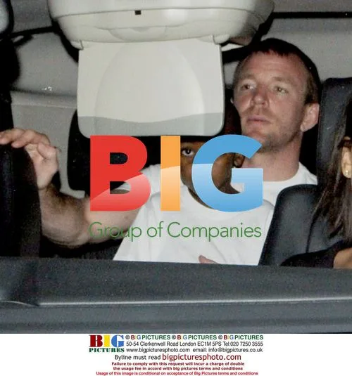 Guy Ritchie and Madonna with kids leaving Kabbalah centre