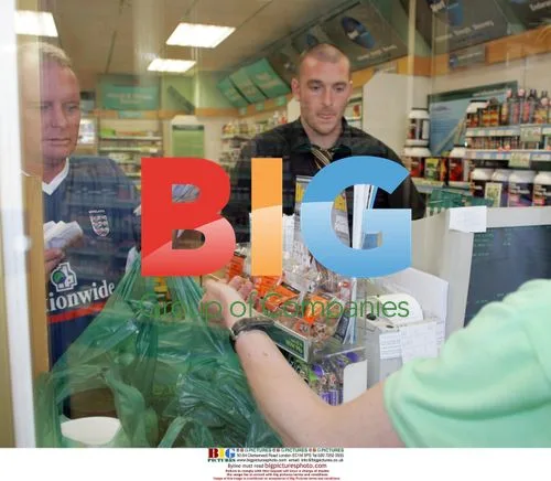 Retired footballer Paul Gascoigne shops at health store