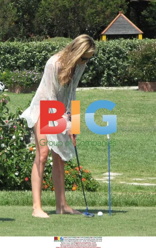 Peter Crouch and Abigail Clancy on the beach