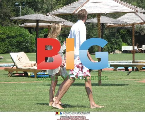 Peter Crouch and Abigail Clancy on the beach, Italy