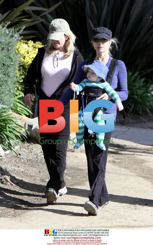 Courtney Thorne-Smith and baby son on nature walk