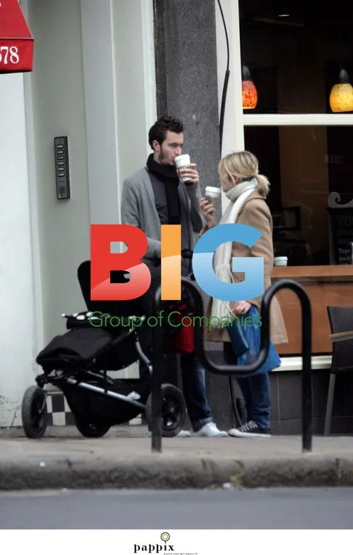 Edith Bowman and Tom Smith out with baby Rudy