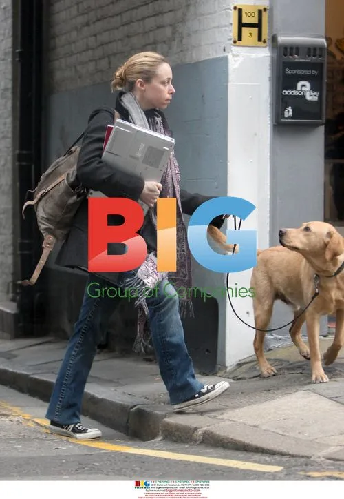Assistant producer Lauren Meek walks dog in London
