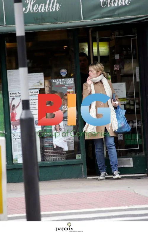 Music critic Edith Bowman with Editors singer Tom Smith and baby