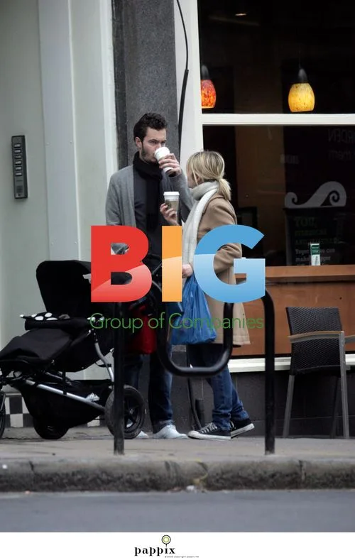 Music critic Edith Bowman out with Editors singer Tom Smith and baby