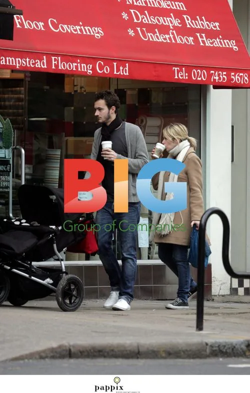 Edith Bowman and Tom Smith out with baby Rudy in London