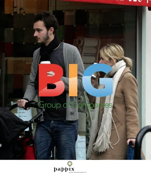 Music critics Edith Bowman and Tom Smith with baby