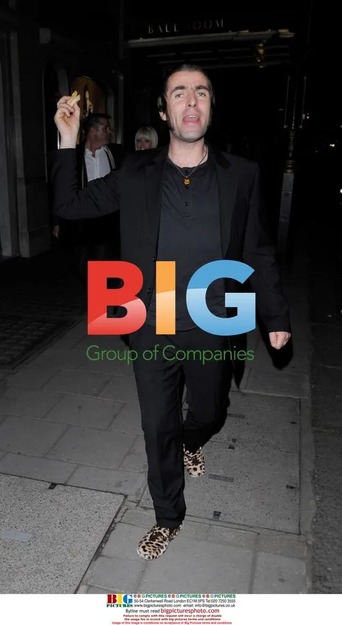 Liam Gallagher leaves Claridges with Appleton sisters