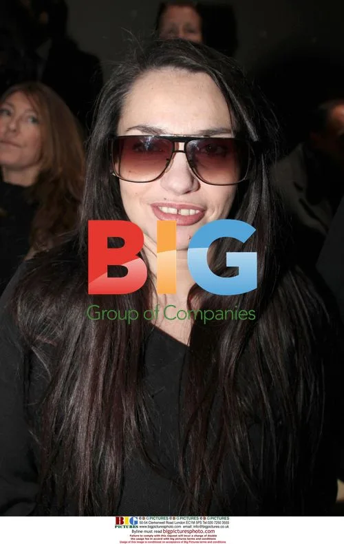 Beatrice Dalle at Givenchy Fashion Show