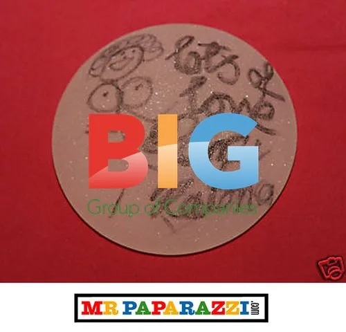 Kerry Katona Sells Breast Implant for Charity Auction