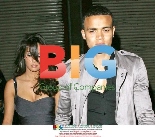 Spurs footballer Jermaine Janus and mystery girl at Crystal nightclub
