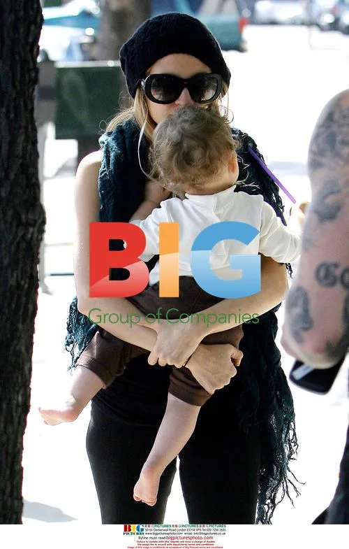 Nicole Richie and Joel Madden with baby Harlow