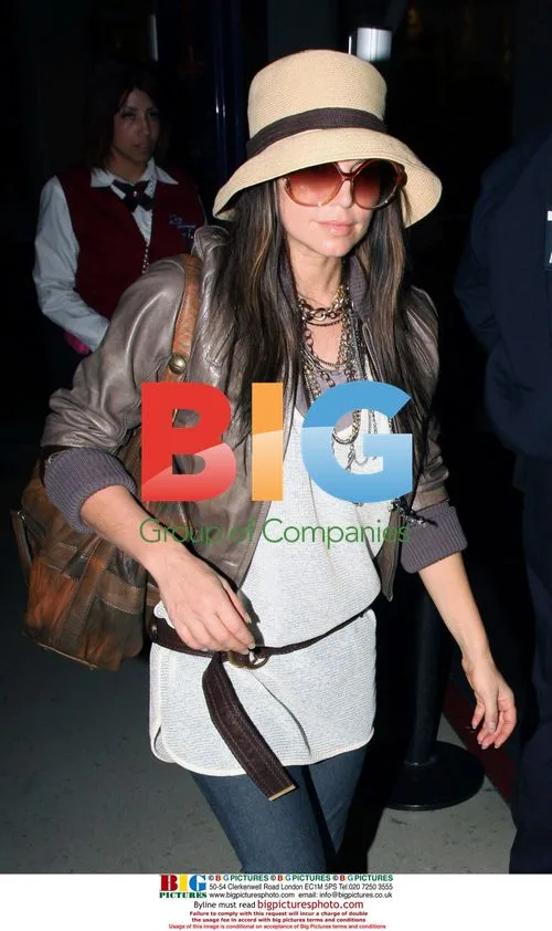 Fergie greeted by fans at LAX