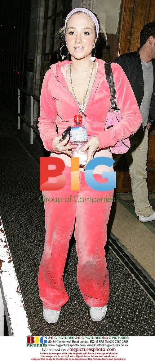 Tula Contostavlos in tracksuit and cap
