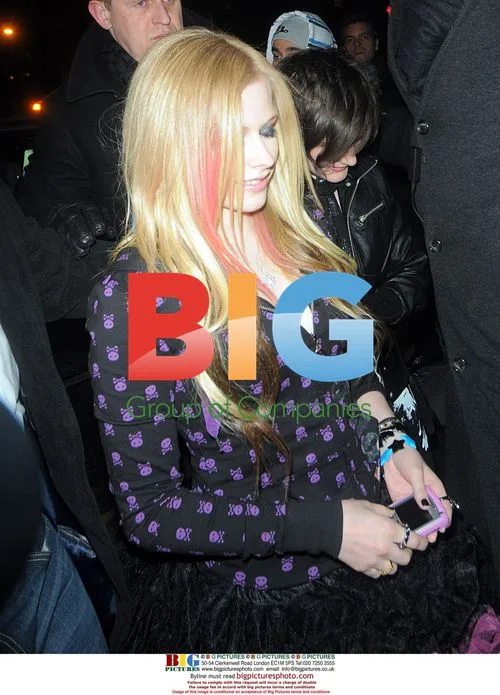 Avril Lavigne out with friends in London