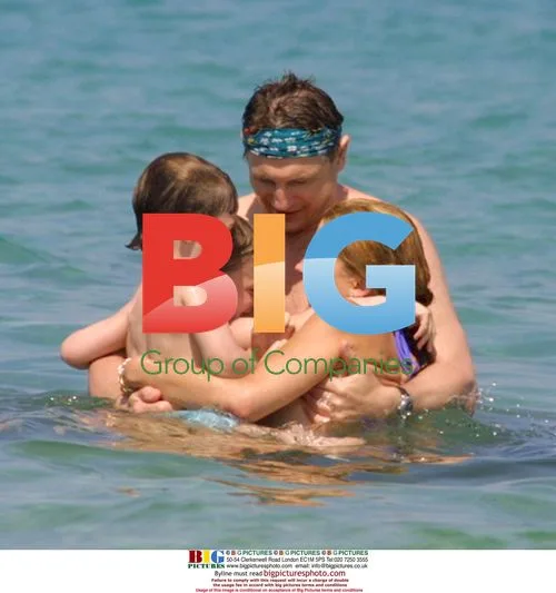 Liam Neeson and Family on Holiday