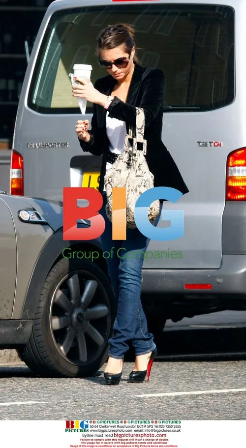 Saskia Boxford Spotted Grabbing Coffee