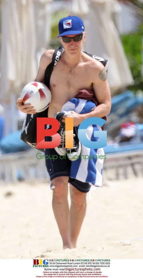 John McEnroe playing in Caribbean sea