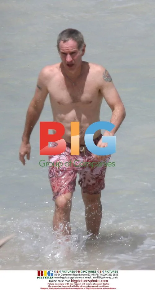 John McEnroe playing in the Caribbean sea