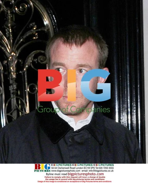 Guy Ritchie Leaves Restaurant with Trudie Styler
