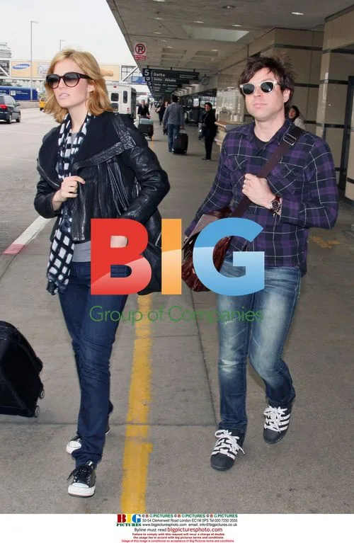 Mandy Moore Arrives at LAX with Husband Ryan Adams