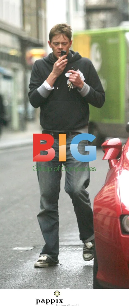 Kris Marshall seen out looking weary