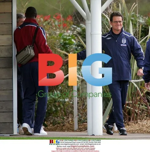 Ledley King and Fabio Capello at England training