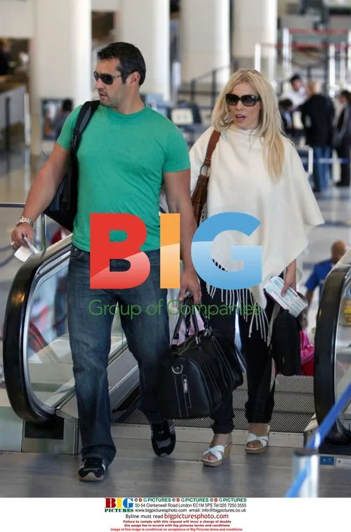 Newlyweds Natasha Bedingfield and Matthew Robinson at LAX