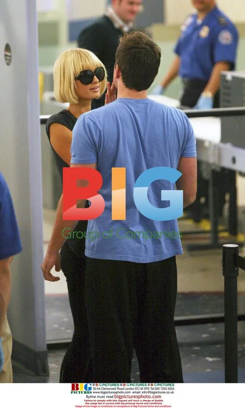 Paris Hilton and Doug Reinhardt at LAX