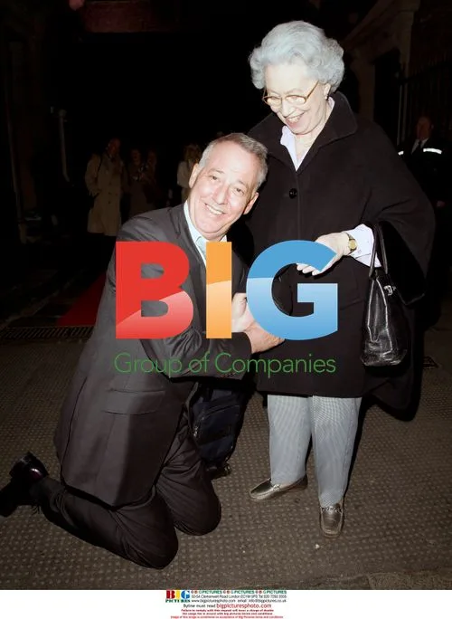 Michael Barrymore bows before 'the Queen' at fundraising gala